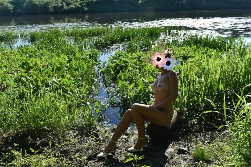 Outdoor Strip Tease: Naked Woman Undressing in Nature