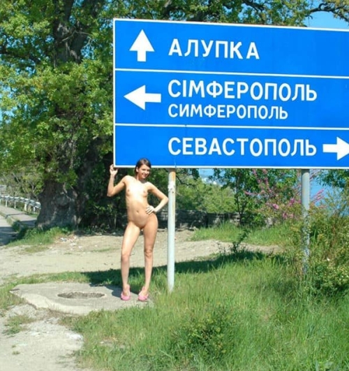 Naked Chick by Road Sign: Explicit Outdoor Nudity