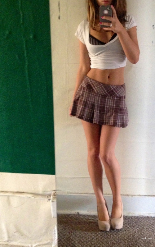 Seductive Girl in Short Skirt: Sultry and Provocative Mini Dress Beauty
