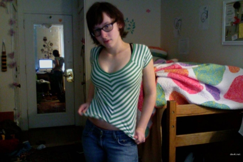 Naked college student poses seductively