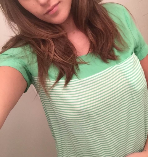Seductive brunette's erotic selfie flaunting slender body